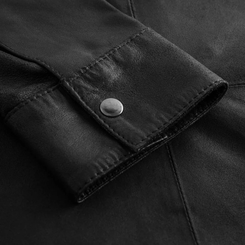 Women’s black leather overshirt with structured shape and smooth leather finish