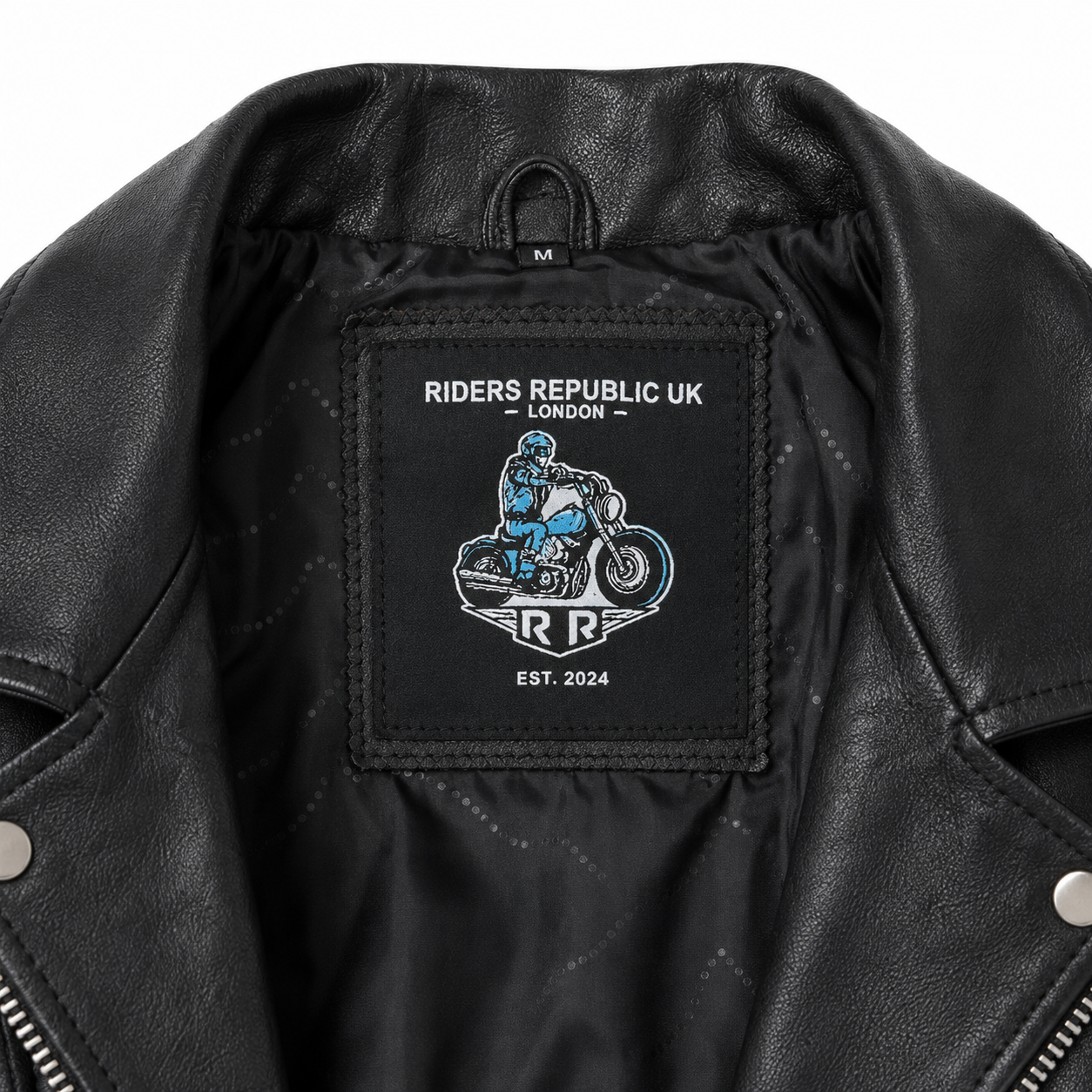 Neck label stitched inside men’s black leather spiked biker jacket