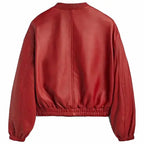 Red leather bomber jacket for women with ribbed cuffs, elastic hem and side pocket detail.