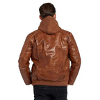 Men’s hooded leather jacket in waxed brown finish with modern everyday streetwear design.