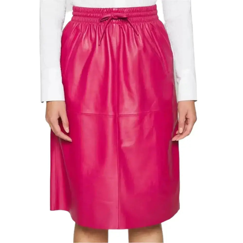Women’s midi leather skirt in soft pink leather for smart casual and evening outfits.