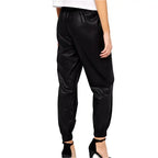 Women’s black leather pants in jogger style with comfortable fit and premium urban fashion design.