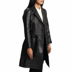Women’s genuine leather quilted coat styled with boots